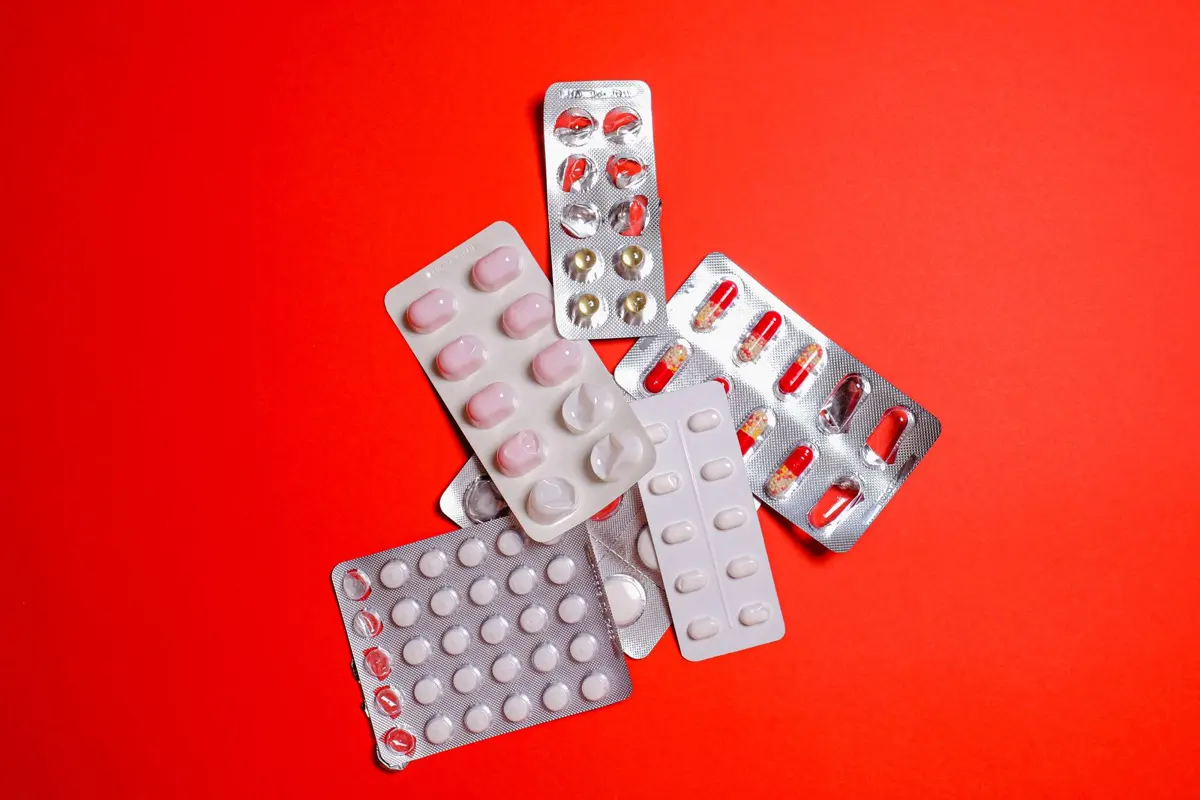 Colourful tablets in blister packs, representing the cancer medicine price drop on 543 brands